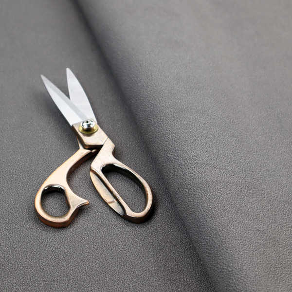Merida Suede upholstery fabric in a medium charcoal grey colour.