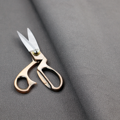 Merida Suede upholstery fabric in a medium charcoal grey colour.