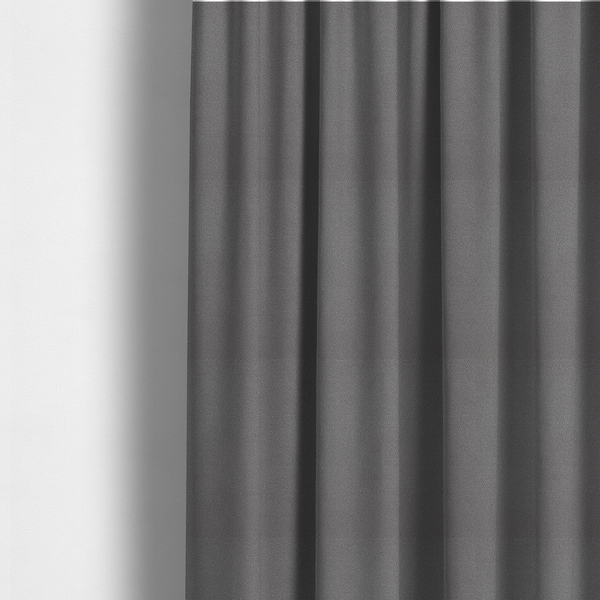 The fabric used to create these made-to-measure curtains is a Merida Suede upholstery fabric in a medium charcoal grey colour.