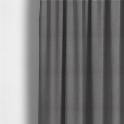 The fabric used to create these made-to-measure curtains is a Merida Suede upholstery fabric in a medium charcoal grey colour.
