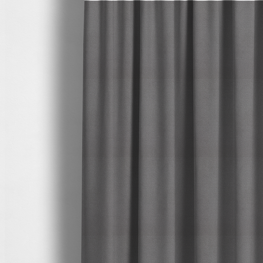 The fabric used to create these made-to-measure curtains is a Merida Suede upholstery fabric in a medium charcoal grey colour.