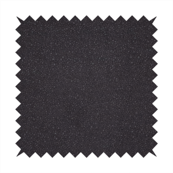 Merida Suede upholstery fabric in a dark purple or deep plum colour.