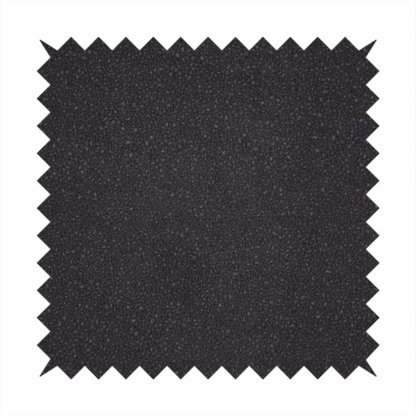 Merida Suede upholstery fabric in a dark purple or deep plum colour.