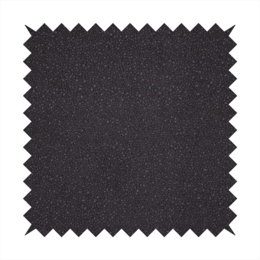 Merida Suede upholstery fabric in a dark purple or deep plum colour.