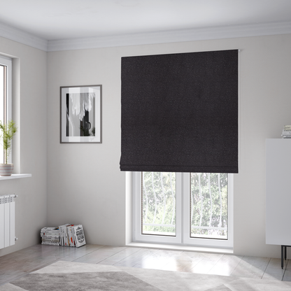 The fabric used to create these Roman blinds is a Merida Suede upholstery fabric in a dark purple or deep plum colour.