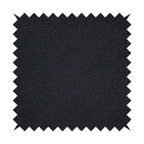 Merida Suede upholstery fabric in a deep charcoal grey or off-black colour.