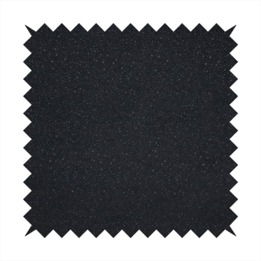 Merida Suede upholstery fabric in a deep charcoal grey or off-black colour.