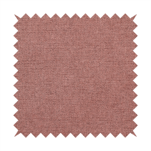 A finely textured weave in a soft, dusty rose or blush pink shade. The material has a subtle heathered appearance with fine variations of lighter pink and darker undertones throughout.