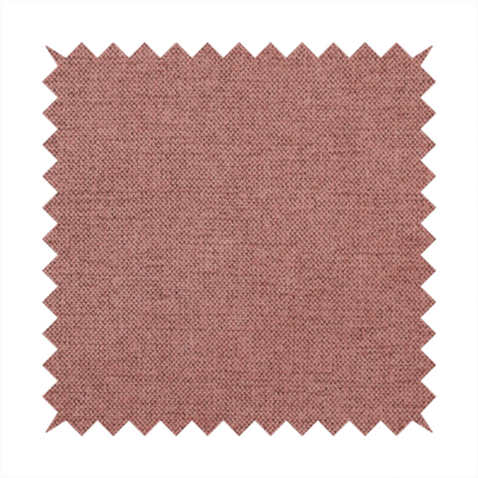 A finely textured weave in a soft, dusty rose or blush pink shade. The material has a subtle heathered appearance with fine variations of lighter pink and darker undertones throughout.