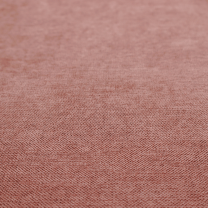 A finely textured weave in a soft, dusty rose or blush pink shade. The material has a subtle heathered appearance with fine variations of lighter pink and darker undertones throughout.