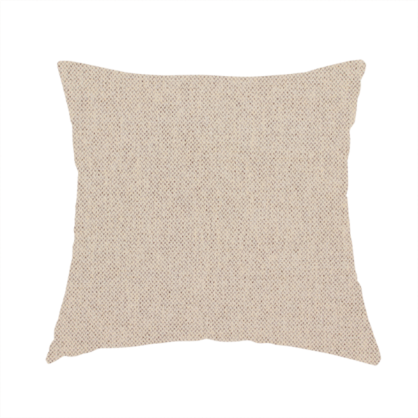 The fabric used to create this handmade cushion is a finely textured weave in a soft cream or light ivory shade. The material features a subtle heathered look with tiny flecks of beige and neutral undertones throughout.