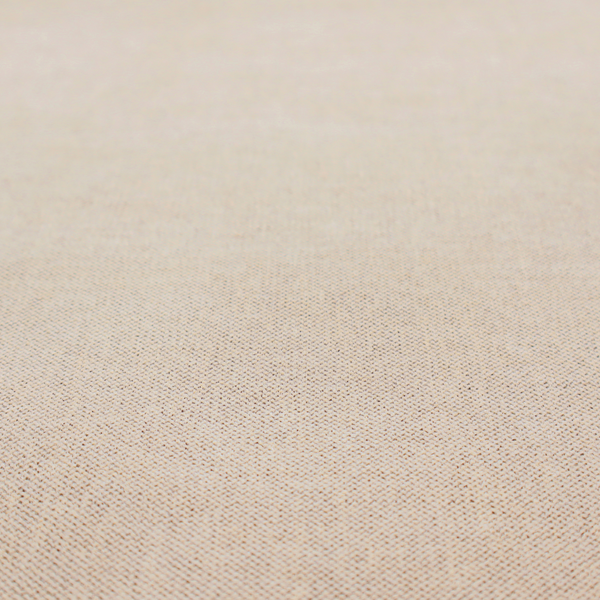 A finely textured weave in a soft cream or light ivory shade. The material features a subtle heathered look with tiny flecks of beige and neutral undertones throughout.