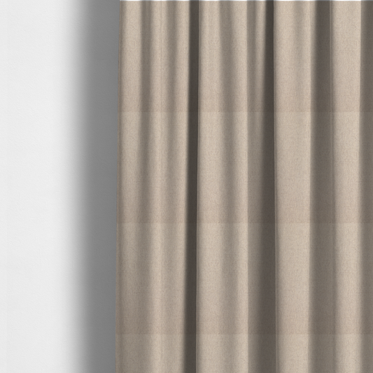 The fabric used to create these made-to-measure curtains is a finely textured weave in a soft cream or light ivory shade. The material features a subtle heathered look with tiny flecks of beige and neutral undertones throughout.