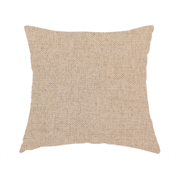 The fabric used to create this handmade cushion is a finely textured weave in a warm beige or natural linen shade. The material features a subtle heathered look with tiny flecks of light tan and neutral undertones throughout.