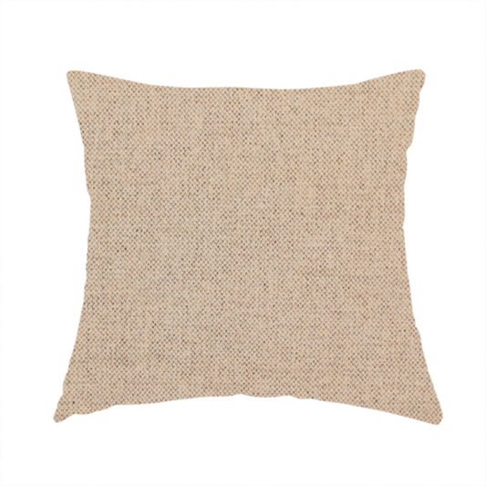 The fabric used to create this handmade cushion is a finely textured weave in a warm beige or natural linen shade. The material features a subtle heathered look with tiny flecks of light tan and neutral undertones throughout.