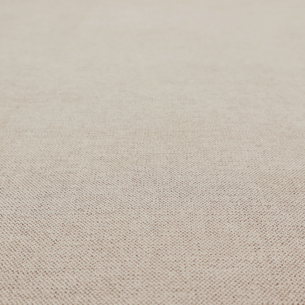 A finely textured weave in a soft greige or light stone shade. The material features a subtle heathered look with tiny flecks of pale grey, cream, and beige undertones throughout.