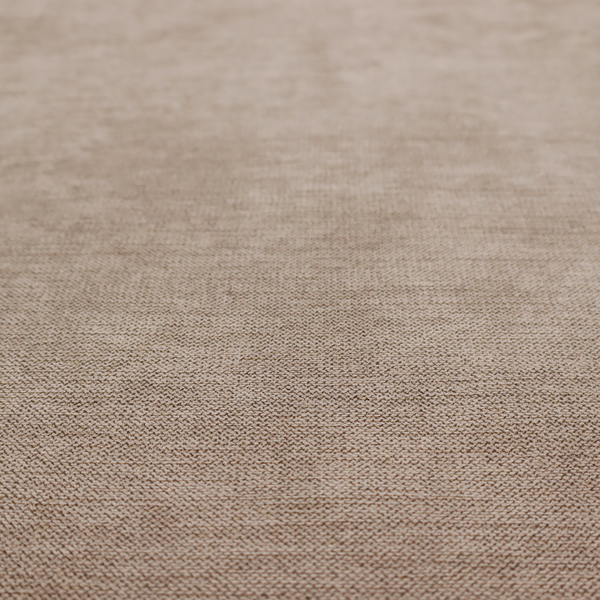A finely textured weave in a warm taupe or light brownish-grey shade. The material features a subtle heathered look with finely blended threads of tan, cream, and soft brown undertones throughout.