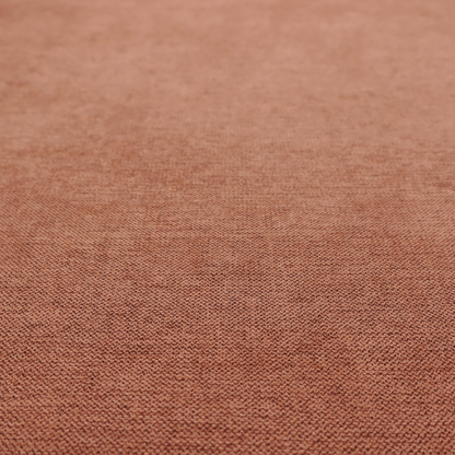 A finely textured weave in a soft terracotta, rust, or muted copper shade. The material features a subtle heathered look with finely blended threads of warm orange-brown and darker neutral undertones throughout.