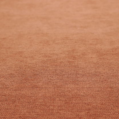 A finely textured weave in a bright ginger, amber, or light rust shade. The material features a subtle heathered look with finely blended threads of warm orange and darker neutral undertones throughout.