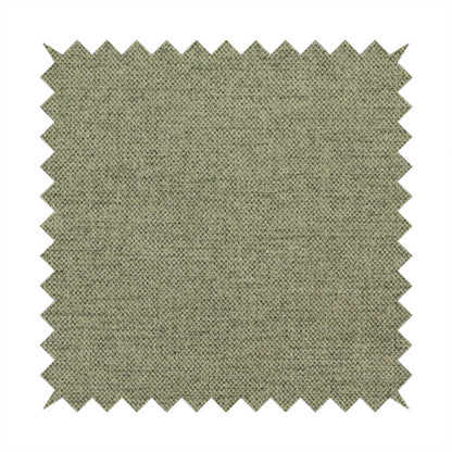 A finely textured weave in a muted sage, olive, or light moss green shade. The material features a subtle heathered look with finely blended threads of earthy green and darker neutral undertones throughout.