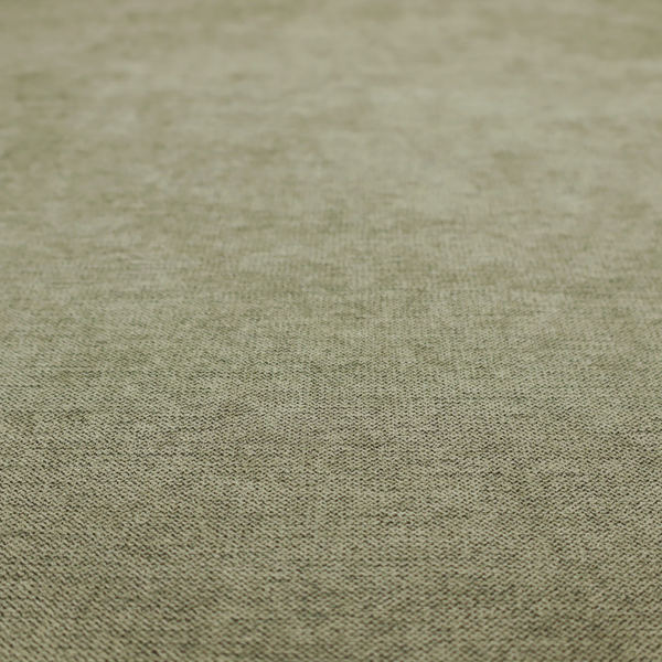 A finely textured weave in a muted sage, olive, or light moss green shade. The material features a subtle heathered look with finely blended threads of earthy green and darker neutral undertones throughout.