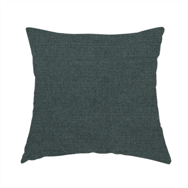 The fabric used to create this handmade cushion is a finely textured weave in a deep teal, slate green, or dark spruce shade. The material features a subtle heathered look with finely blended threads of rich blue-green and darker neutral undertones throughout.