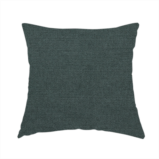 The fabric used to create this handmade cushion is a finely textured weave in a deep teal, slate green, or dark spruce shade. The material features a subtle heathered look with finely blended threads of rich blue-green and darker neutral undertones throughout.