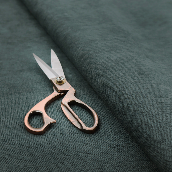 A finely textured weave in a deep teal, slate green, or dark spruce shade. The material features a subtle heathered look with finely blended threads of rich blue-green and darker neutral undertones throughout.
