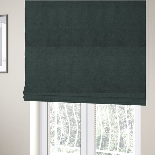 The fabric used to create these Roman blinds is a finely textured weave in a deep teal, slate green, or dark spruce shade. The material features a subtle heathered look with finely blended threads of rich blue-green and darker neutral undertones throughout.