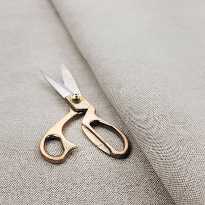 A finely textured weave in a pale silver, heather grey, or light ash tone. The material features a subtle heathered look with finely blended threads of cool grey and white undertones throughout.