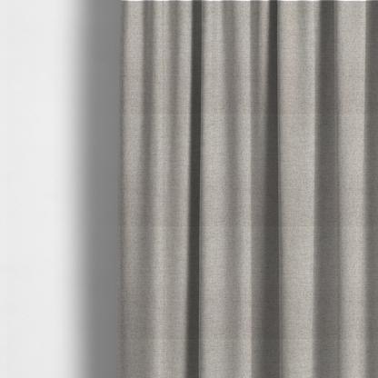 The fabric used to create these made-to-measure curtains is a finely textured weave in a pale silver, heather grey, or light ash tone. The material features a subtle heathered look with finely blended threads of cool grey and white undertones throughout.