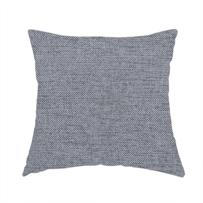 The fabric used to create this handmade cushion is a finely textured weave in a medium steel grey or slate grey shade. The material features a subtle heathered look with finely blended threads of cool grey, soft charcoal, and muted blue-grey tones throughout.