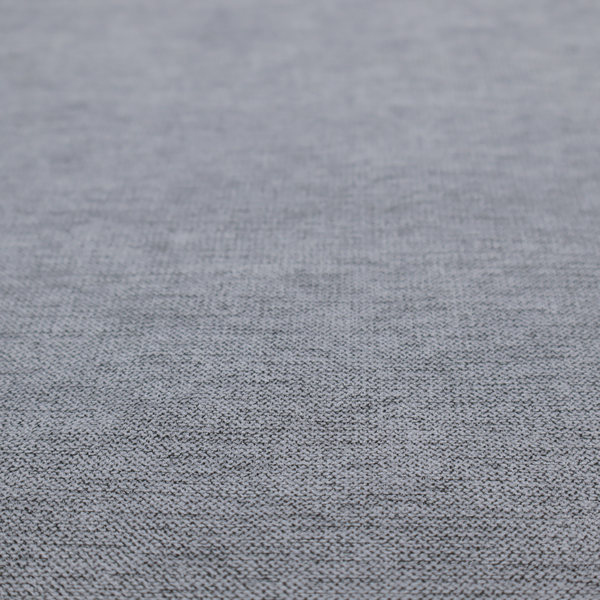 A finely textured weave in a medium steel grey or slate grey shade. The material features a subtle heathered look with finely blended threads of cool grey, soft charcoal, and muted blue-grey tones throughout.