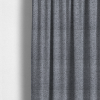 The fabric used to create these made-to-measure curtains is a finely textured weave in a medium steel grey or slate grey shade. The material features a subtle heathered look with finely blended threads of cool grey, soft charcoal, and muted blue-grey tones throughout.