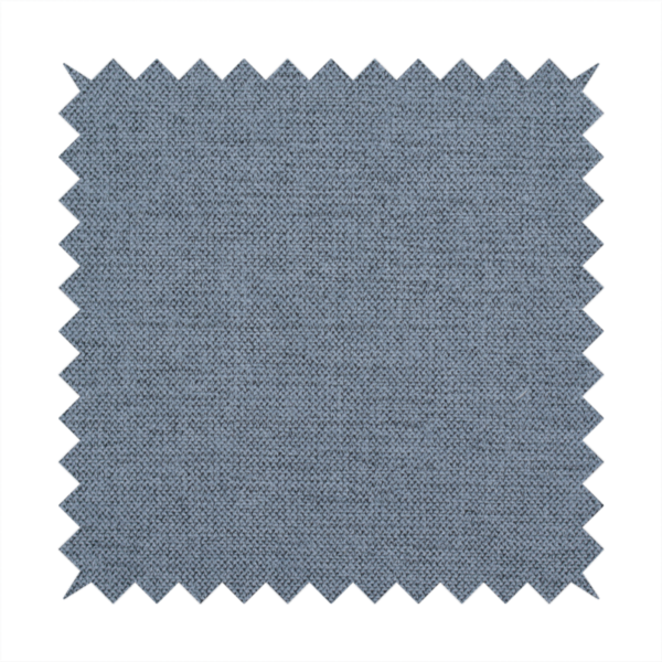 A finely textured weave in a soft denim, slate blue, or pigeon blue shade. The material features a subtle heathered look with finely blended threads of muted blue and cool grey undertones throughout.
