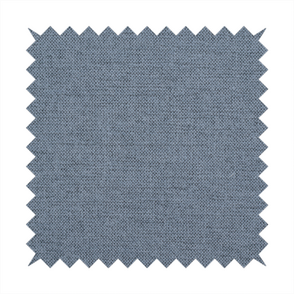 A finely textured weave in a soft denim, slate blue, or pigeon blue shade. The material features a subtle heathered look with finely blended threads of muted blue and cool grey undertones throughout.
