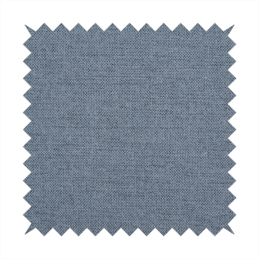 A finely textured weave in a soft denim, slate blue, or pigeon blue shade. The material features a subtle heathered look with finely blended threads of muted blue and cool grey undertones throughout.