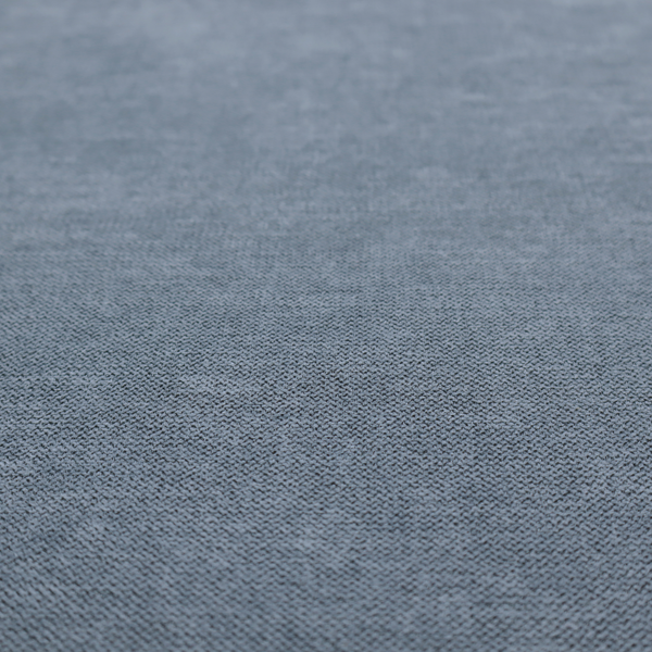 A finely textured weave in a soft denim, slate blue, or pigeon blue shade. The material features a subtle heathered look with finely blended threads of muted blue and cool grey undertones throughout.