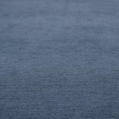 A finely textured weave in a rich mid-blue, ocean blue, or deep slate blue shade. The material features a subtle heathered look with finely blended threads of classic blue and darker grey undertones throughout.