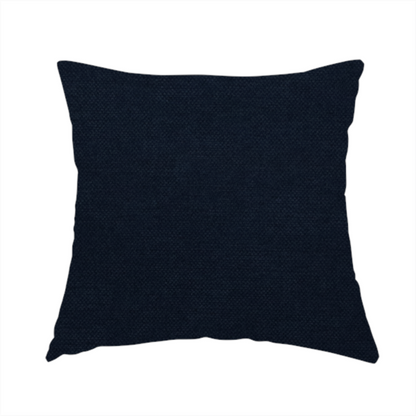The fabric used to create this handmade  cushion is a finely textured, tight weave in a deep navy or midnight blue shade. The material features a subtle, uniform micro-textured look with very dark neutral undertones throughout.