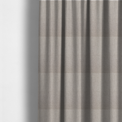 The fabric used to create these made-to-measure curtains is a finely textured weave in a light greige, taupe, or soft pebble grey shade. The material features a subtle heathered look with finely blended threads of cool grey and warm beige undertones throughout.