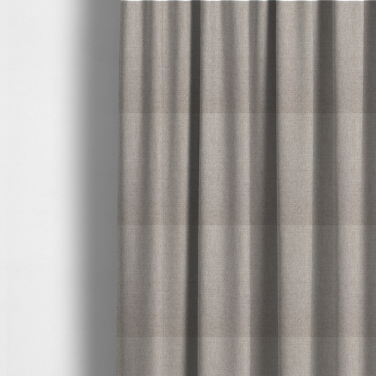 The fabric used to create these made-to-measure curtains is a finely textured weave in a light greige, taupe, or soft pebble grey shade. The material features a subtle heathered look with finely blended threads of cool grey and warm beige undertones throughout.