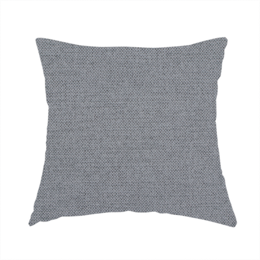 The fabric used to create this handmade cushion is a  finely textured weave in a medium mineral grey or cool slate shade. The material features a subtle heathered look with finely blended threads of classic grey, white, and faint charcoal undertones throughout.