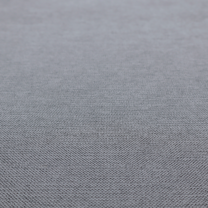 A finely textured weave in a medium mineral grey or cool slate shade. The material features a subtle heathered look with finely blended threads of classic grey, white, and faint charcoal undertones throughout.