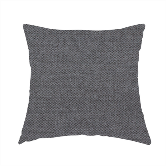 The fabric used to create this handmade cushion is a finely textured weave in a deep charcoal, graphite, or dark slate grey shade. The material features a subtle heathered look with finely blended threads of black, deep grey, and soft ash undertones throughout.