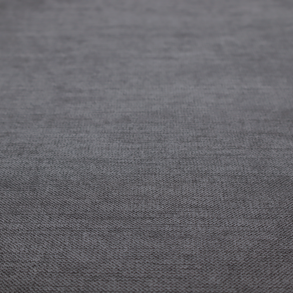 A finely textured weave in a deep charcoal, graphite, or dark slate grey shade. The material features a subtle heathered look with finely blended threads of black, deep grey, and soft ash undertones throughout.