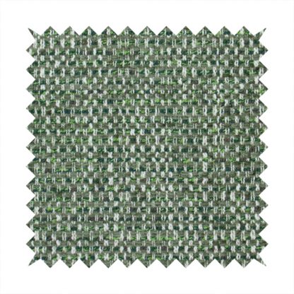 The material features a dense, multi-toned green tweed pattern, intricately interlaced with small flecks of white, bright lime green, and dark brown threads throughout.