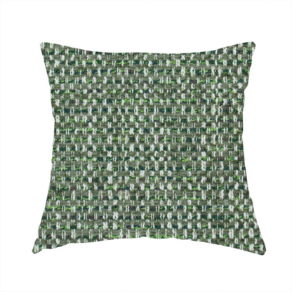 The fabric used to create this handmade cushion is a material features a dense, multi-toned green tweed pattern, intricately interlaced with small flecks of white, bright lime green, and dark brown threads throughout.