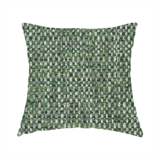 The fabric used to create this handmade cushion is a material features a dense, multi-toned green tweed pattern, intricately interlaced with small flecks of white, bright lime green, and dark brown threads throughout.