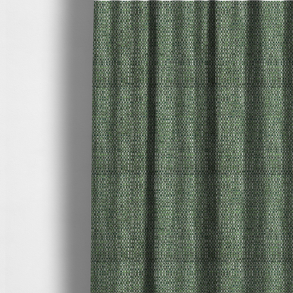 The fabric used to create these made-to-measure curtains is a material features a dense, multi-toned green tweed pattern, intricately interlaced with small flecks of white, bright lime green, and dark brown threads throughout.